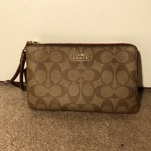 Brand new brown coach wristlet